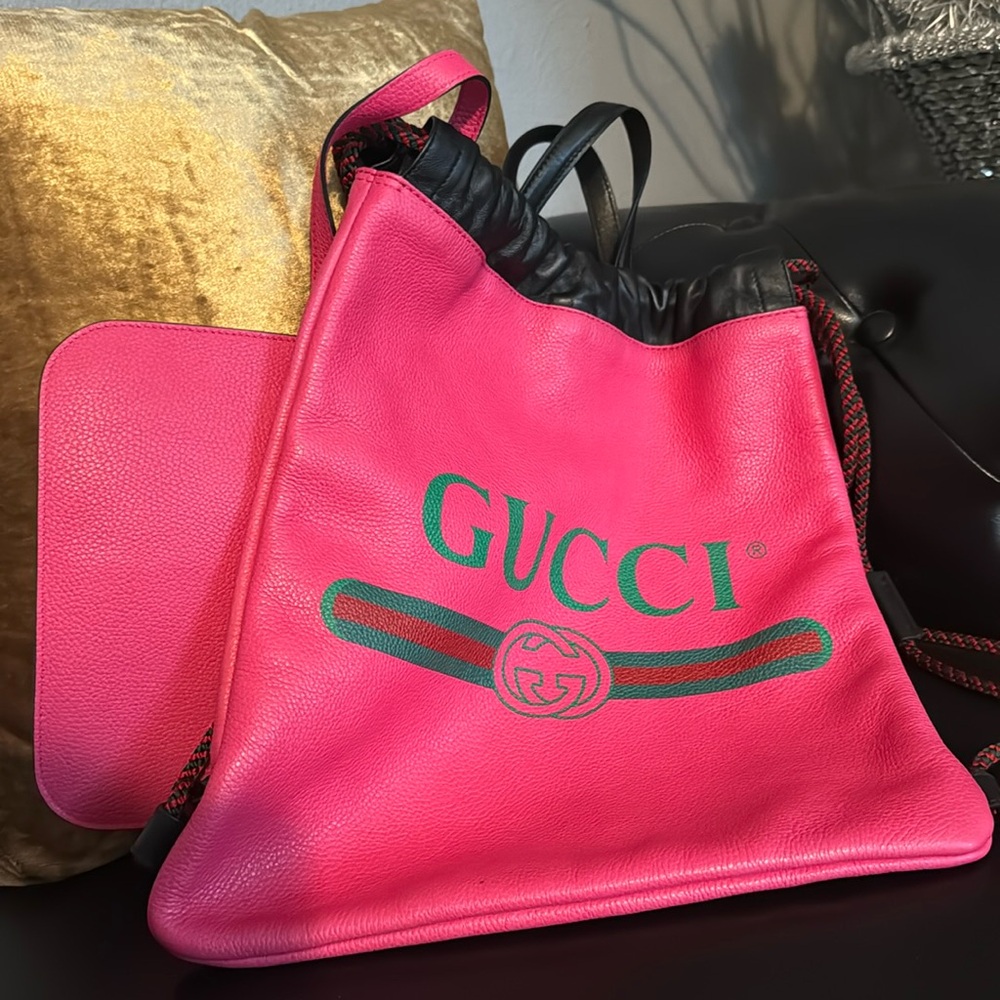 Gucci pink leather drawstring bag. Preowned but in great condition.
